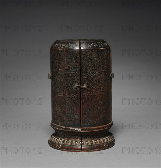 Portable Shrine, c. 1500. Tibet, early 16th century. Wood with mineral pigments; diameter: 16.2 cm (6 3/8 in.); overall: 25.4 cm (10 in.).