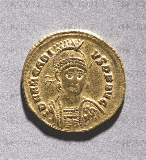 Tremissis of Honorius (obverse), 395-423. Byzantium, Ravenna, Byzantine period, late 4th-early 5th Century. Gold; diameter: 1.5 cm (9/16 in.)