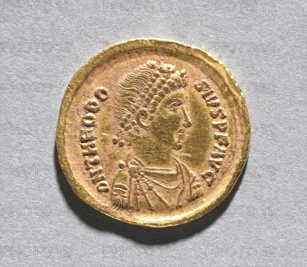 Solidus of Theodosius I the Great , 383-388. Byzantium, Constantinople, Byzantine period, 4th century. Gold; diameter: 2.1 cm (13/16 in.).