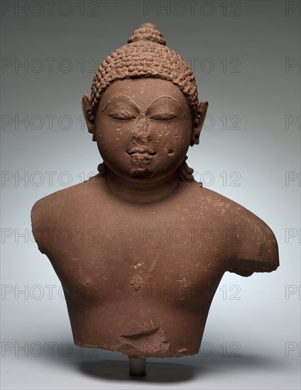 Bust of Tirthankara Rsabhanatha, 800s-900s. Central India, Chandela Dynasty, 9th - 10th Century. Stone; overall: 51.4 x 39.4 cm (20 1/4 x 15 1/2 in.).