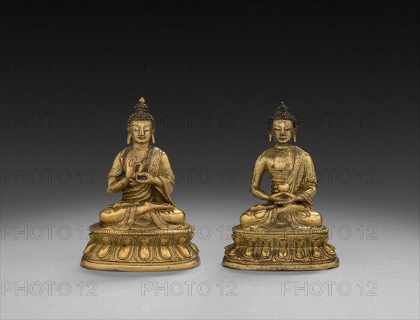 Pair of Seated Buddhas, 1500s. China, Ming dynasty (1368-1644). Gilt bronze; overall: 9.9 cm (3 7/8 in.).