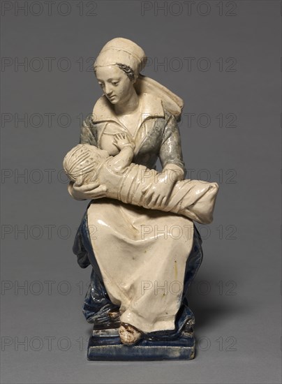 Figure of the Nurse, early 1600s. Attributed to Claude Bertélémy de Blénod (French). Faience with enamel decoration; overall: 23.5 x 11.6 x 11.6 cm (9 1/4 x 4 9/16 x 4 9/16 in.)