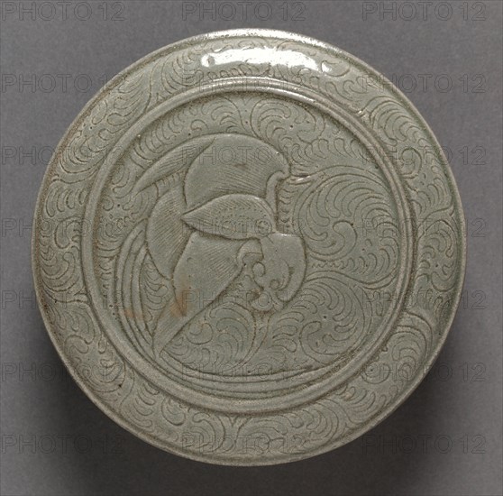 Covered Box: Yue Ware (lid), 907-960. China, Shang-lin-hu kilns, Yu-yao District, Zhejiang province, Five dynasties (907-960). Glazed stoneware with incised decoration; diameter: 13 cm (5 1/8 in.).