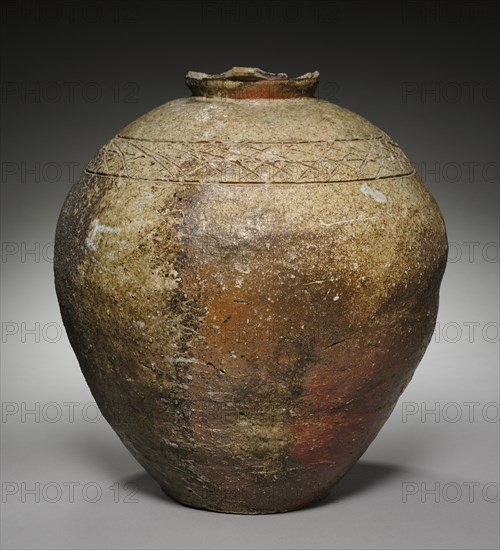 Storage Jar, late 1300s-1400s. Japan, Muromachi period (1392-1573). Stoneware with natural ash glaze (Shigaraki ware); diameter: 45.7 x 39 cm (18 x 15 3/8 in.); overall: 42 cm (16 9/16 in.).