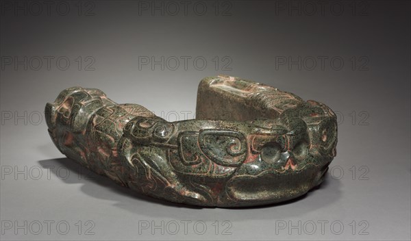 Ballgame Hip Protector (Yoke), 600-900. Mexico, Gulf Coast, Classic Veracruz style (600-1100). Greenstone, pigment; overall: 41.5 x 37.5 x 11 cm (16 5/16 x 14 3/4 x 4 5/16 in.).