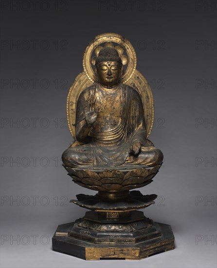 Medicine Master Buddha (Yakushi Nyorai), 1100s. Japan, late Heian period (c. 900-1185). Gilded wood; overall: 145.4 cm (57 1/4 in.); figure: 88.2 cm (34 3/4 in.); pedestal: 57.2 cm (22 1/2 in.).