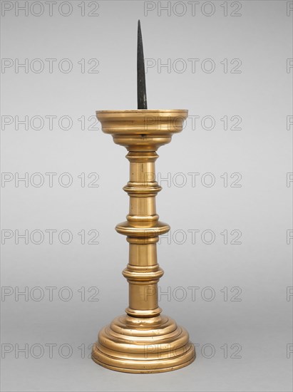 Pricket Candlestick, early 1500s. South Netherlands, Valley of the Meuse, 16th century. Brass (hollow cast in three parts) and iron; overall: 45.5 x 19.6 cm (17 15/16 x 7 11/16 in.)