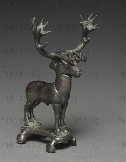 Stag Poletop, 1400-1200 BC. Eastern Anatolia, Hittite, 15th-13th century BC. Bronze, solid cast; overall: 13.8 x 7.9 x 9.2 cm (5 7/16 x 3 1/8 x 3 5/8 in.).