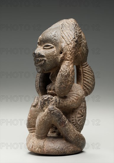 Figure, possibly early 1400s. Guinea Coast, Sierra Leone, so-called Sapi, possibly early 15th century. Soapstone ; overall: 23.8 x 11.2 x 12.5 cm (9 3/8 x 4 7/16 x 4 15/16 in.)