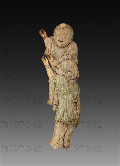 Wall Plaque with Two Boys Playing, 18th century. China, Qing dynasty (1644-1911). Ivory with traces of polychrome; overall: 23.5 cm (9 1/4 in.).