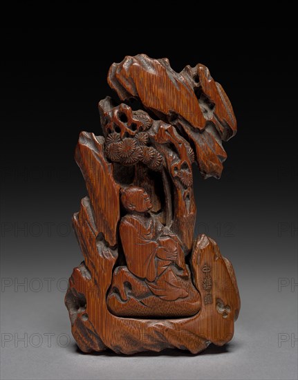 Clip for Paper with Sage Seated Under a Pine, 1600s. Pu Zhongqian (Chinese, active 1600s). Carved bamboo; overall: 9.5 cm (3 3/4 in.).