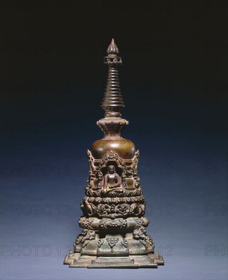 Miniature Votive Stupa, c. 1000s. Eastern India, Pala Period, 11th century. Bronze with inlay of semi-precious stones; overall: 29.2 cm (11 1/2 in.).