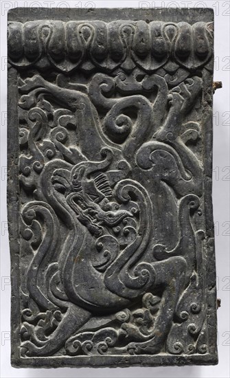 Section of a Coffin Platform: Dragon, 550-577. China, Northern Qi dynasty (550-577). Limestone; overall: 45.7 x 211.4 x 10.8 cm (18 x 83 1/4 x 4 1/4 in.); panel: 45.7 x 26.3 x 10.8 cm (18 x 10 3/8 x 4 1/4 in.).