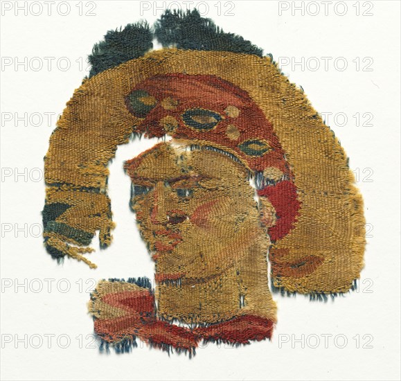 Human Head from a Large Curtain, 300s. Egypt, Byzantine period, 4th Century. Tapestry weave, wool; overall: 17 x 31 cm (6 11/16 x 12 3/16 in.)