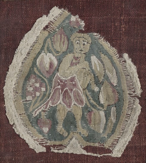 Spade-shaped Ornament, 600s - 700s. Egypt, 7th - 8th century. Tapestry (originally inwoven in tabby ground); linen and wool; overall: 8.8 x 9.5 cm (3 7/16 x 3 3/4 in.)