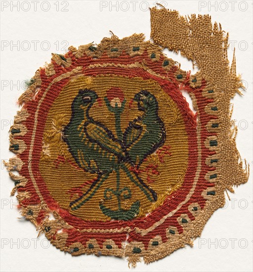 Segmentum from a Tunic, 600s - 700s. Egypt, Umayyad period (?), 7th - 8th century. Tabby weave, inwoven tapestry ornament; wool and linen; overall: 10.7 x 11.7 cm (4 3/16 x 4 5/8 in.).