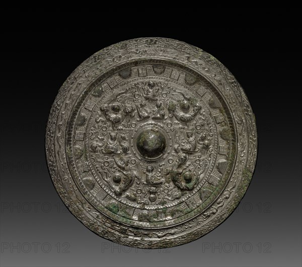 Mirror with Xiwangmu, c. 317-400. China, early Six Dynasties Period (317-581). Bronze; diameter: 18.5 cm (7 5/16 in.).