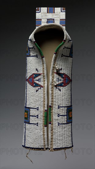 Cradle or Carrier, c. 1900. America, Native North American, Plains, Lakota (Sioux) people, Post-Contact. Native-tanned hide, cotton cloth, glass beads, metal beads, brass bell, sinew thread, cotton thread; overall: 22.9 x 25.4 cm (9 x 10 in.).
