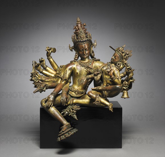 Uma-Maheshvara, 1300s. Nepal, 14th century. Gilt bronze; overall: 29.8 x 27.2 cm (11 3/4 x 10 11/16 in.); with base: 32.6 cm (12 13/16 in.).