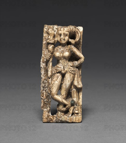 Young Woman with a Spear, c. 50-200. Afghanistan, Begram, Kushan period (c. 80-320). Ivory; overall: 9 x 4 x 1.7 cm (3 9/16 x 1 9/16 x 11/16 in.).