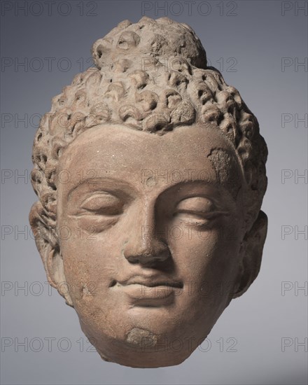 Head of Buddha, 700s. India, Kashmir, Akhnur school, 8th century. Clay, accidentally burned; overall: 23.5 x 16.5 cm (9 1/4 x 6 1/2 in.).