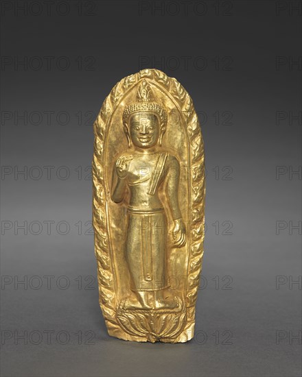 Standing Buddha, 1100s. Myanmar (Burma), Pegu, 12th century. Gold repoussé; overall: 13.8 x 5.7 cm (5 7/16 x 2 1/4 in.).