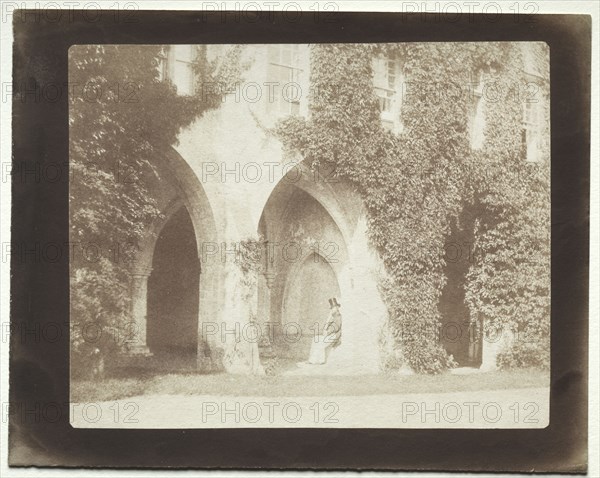 Calvert Jones Seated in the Sacristy of Lacock Abbey, 1845. William Henry Fox Talbot (British, 1800-1877). Salted paper print from calotype negative; image: 16.5 x 20.6 cm (6 1/2 x 8 1/8 in.); paper: 19.6 x 24.9 cm (7 11/16 x 9 13/16 in.); matted: 35.6 x 45.7 cm (14 x 18 in.)