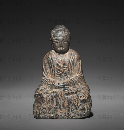 Seated Sakyamuni Buddha, 500s-600s. Korea, Three Kingdoms period (57 BC-AD 668). Stone; overall: 11.4 x 7.6 x 7 cm (4 1/2 x 3 x 2 3/4 in.).