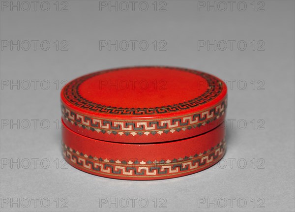Round Box, c. 1770. France, 18th century. Tortoise shell decorated in red lacquer with inlays of gold, brass, and silver; contains a portrait miniature; diameter: 2.3 x 6.4 cm (7/8 x 2 1/2 in.).