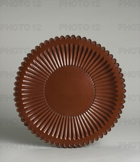 Fluted Tray, 14th Century. China, Yuan dynasty (1271-1368) - Ming dynasty (1368-1644). Red lacquer; diameter: 32.7 cm (12 7/8 in.).