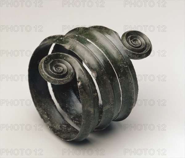 Turned Armilla, c. 1500 BC. Hungary, Bronze Age, c. 2500-800 BC. Bronze, wrought; overall: 12.5 x 10.4 cm (4 15/16 x 4 1/8 in.).