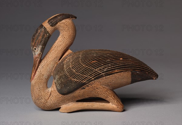 Heron Aryballos, c. 580 BC. Greece, Milesian, Eastern province, 6th Century BC. Earthenware with slip decoration; overall: 13 x 5.8 cm (5 1/8 x 2 5/16 in.).