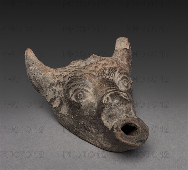 Bull's-head Lamp, 1st Century BC - 1st Century AD. Greece, Greco-Roman Period. Nile silt clay; overall: 3.8 x 6.3 cm (1 1/2 x 2 1/2 in.).