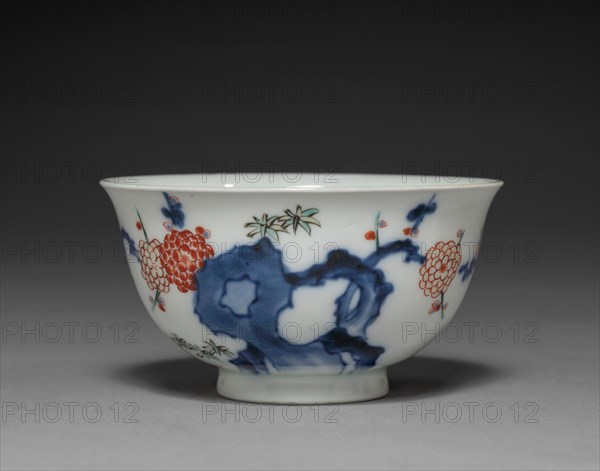 Cup with Rock and Prunus Decoration: Kakiemon Type, 18th century. Japan, Edo Period (1615-1868). Porcelain with underglaze blue and overglaze enamel decoration, cursive "fuku" mark in underglaze blue; diameter: 10.5 cm (4 1/8 in.); overall: 5.8 cm (2 5/16 in.).