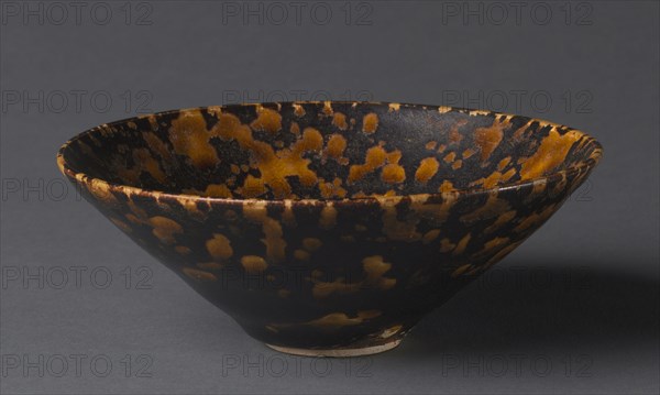 Conical Bowl, 1100s. China, Jiangxi province, Ji'an, Southern Song dynasty (1127-1279). Stoneware with "tortoise shell" glaze, Jizhou ware; diameter: 14.8 cm (5 13/16 in.); overall: 5.4 cm (2 1/8 in.).