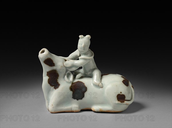 Buffalo with Rider:  Qingbai Ware, early 14th Century. China, Jiangxi province, Jingdezhen kilns, Yuan dynasty (1271-1368). Glazed porcelain with iron spots; overall: 6.9 cm (2 11/16 in.).