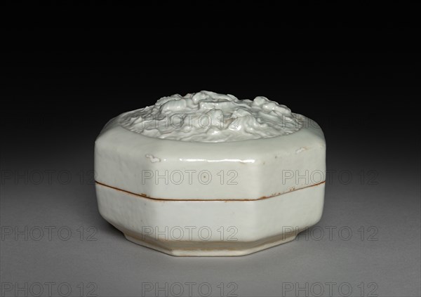 Hexagonal Covered Box with Lions in Relief: Qingbai Ware, 1300-1325. China, Jiangxi province, Jingdezhen kilns, Yuan dynasty (1271-1368). Glazed porcelain with molded and applied decoration; overall: 6.1 x 9.8 cm (2 3/8 x 3 7/8 in.).