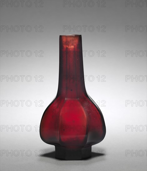 Faceted Bottle, 1736-1795. China, Qing dynasty (1644-1911), Qianlong mark and reign (1736-1795). Red Peking glass; diameter: 8 cm (3 1/8 in.); overall: 14.1 cm (5 9/16 in.).