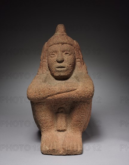 Seated Deity, 1350-1519. Mexico, Aztec, Valley of Mexico near Teotihuacan, Macuilxochitl (?), 14th-16th century. Gray volcanic stone with red pigment; overall: 37.5 x 20.3 x 24.8 cm (14 3/4 x 8 x 9 3/4 in.).