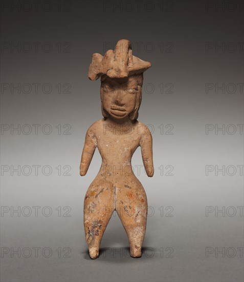 Female Figurine with Headdress, 1200-900 BC. Mexico, Tlatilco, type D1. Pottery with traces of white and red pigment; overall: 11.2 x 3.7 x 4.2 cm (4 7/16 x 1 7/16 x 1 5/8 in.).