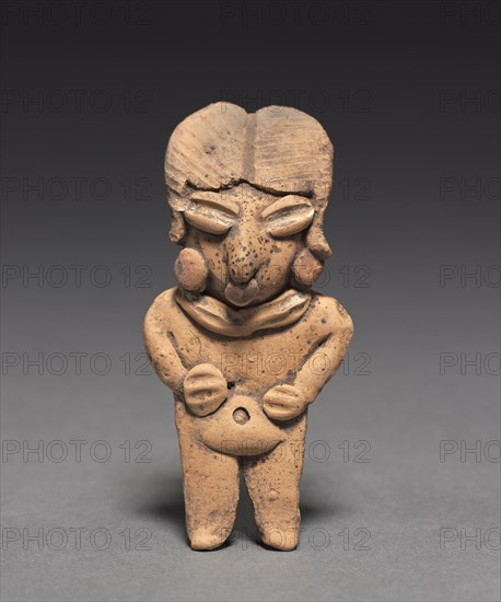 Male Figurine, 400-100 BC. Mexico, Guanajuato, Chupícuaro. Pottery with white and red pigment; overall: 8.9 x 4.2 x 2 cm (3 1/2 x 1 5/8 x 13/16 in.).