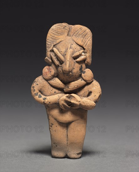 Male Figurine, 400-100 BC. Mexico, Guanajuato, Chupícuaro. Pottery with traces of white and red pigment; overall: 9.2 x 4.8 x 1.9 cm (3 5/8 x 1 7/8 x 3/4 in.).