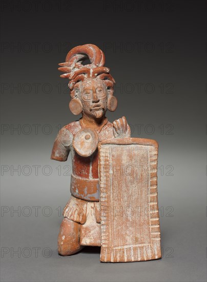 Warrior Figurine with Shield, 600-900. Mexico, Classic Maya, Jaina style. Molded and modeled pottery with traces of pigment; overall: 17.3 x 9.2 x 7.9 cm (6 13/16 x 3 5/8 x 3 1/8 in.).