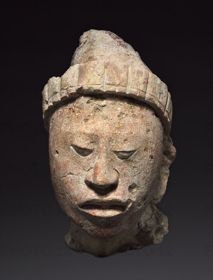 Head from a Building's Façade, 250-900. Mexico, Campeche, Maya style (250-900). Stucco, paint; overall: 33.2 x 17.5 x 29.7 cm (13 1/16 x 6 7/8 x 11 11/16 in.).