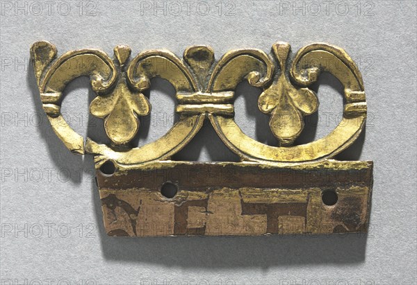 Fragment of an Ornamental Crest from a Reliquary Shrine, c. 1165-1180. Mosan, Meuse Valley, Maastricht?, Gothic period, 12th century. Gilded copper, émail brun (brown enamel); overall: 5.5 x 3.1 cm (2 3/16 x 1 1/4 in.)