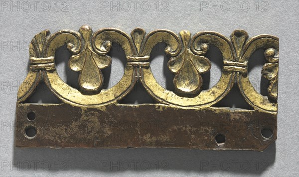 Fragment of an Ornamental Crest from a Reliquary Shrine, c. 1165-1180. Mosan, Meuse Valley, Maastricht?, 12th century. Gilded copper, émail brun (brown enamel); overall: 7.2 x 3.2 cm (2 13/16 x 1 1/4 in.)