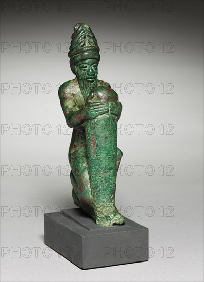 "Foundation Nail" of Gudea, c. 2100 BC. Neo-Sumerian, Iraq, probably Lagash, c. 2100 BC. Copper alloy, lost-wax cast; overall: 17.5 x 4.5 x 7.3 cm (6 7/8 x 1 3/4 x 2 7/8 in.); with base: 20.9 x 6.3 x 9.1 cm (8 1/4 x 2 1/2 x 3 9/16 in.).