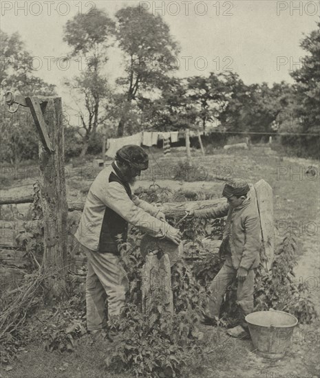 Pictures of East Anglian Life, pl. XXX: At the Grindstone--A Suffolk Farmyard, 1888. Peter Henry Emerson (British, 1856-1936), Sampson Low, Marston, Searle and Rivington. Photogravure; image: 26.7 x 22.7 cm (10 1/2 x 8 15/16 in.); paper: 42.5 x 33.6 cm (16 3/4 x 13 1/4 in.); matted: 50.8 x 40.6 cm (20 x 16 in.).