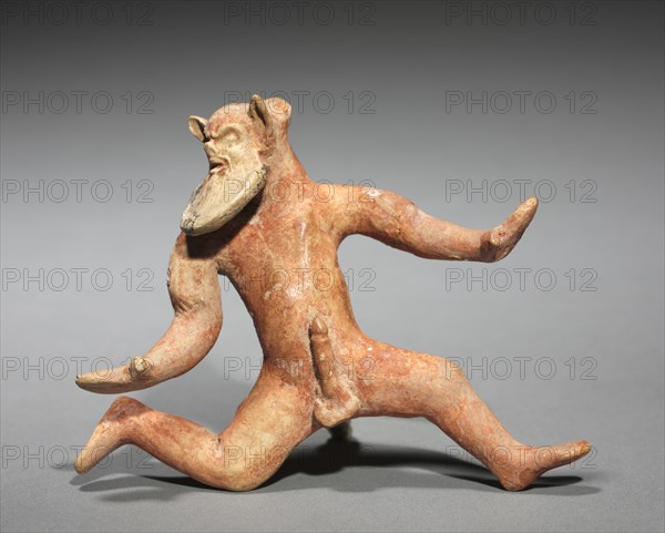 Dancing Satyr, 500-475 BC. Greece, Boeotia, early 5th Century BC. Painted terracotta; overall: 8.4 x 11 x 5.6 cm (3 5/16 x 4 5/16 x 2 3/16 in.).