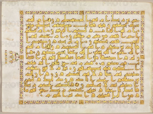 Page from a Koran (recto), 800s. North Africa, Aghlabid or Abbasid. Gold, ink and colors on parchment; overall: 26.7 x 36.3 cm (10 1/2 x 14 5/16 in.); folio: 36.3 cm (14 5/16 in.); text area: 22.8 x 30 cm (9 x 11 13/16 in.).